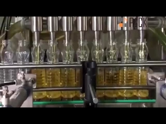 Máquina automática de llenado de aceite de alimentos de tipo lineal amigable para el usuario con boquillas de succión de vacío